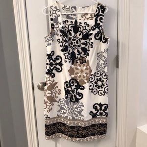 Cream and black sleeveless dress